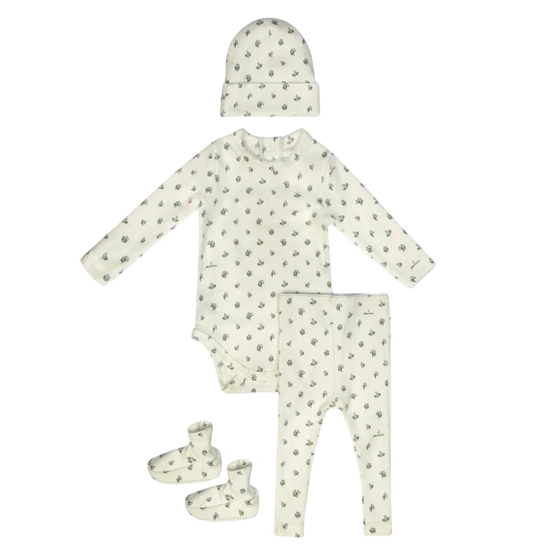 A breathtaking Little Parni Floral Layette Set featuring onesie, leggings, beanie, and booties, showcasing its authoritative architectural fit and refined botanical print.