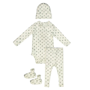 A breathtaking Little Parni Floral Layette Set featuring onesie, leggings, beanie, and booties, showcasing its authoritative architectural fit and refined botanical print.