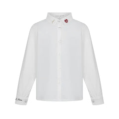 A front view of the Little Parni girl's elegant embroidered shirt in white.