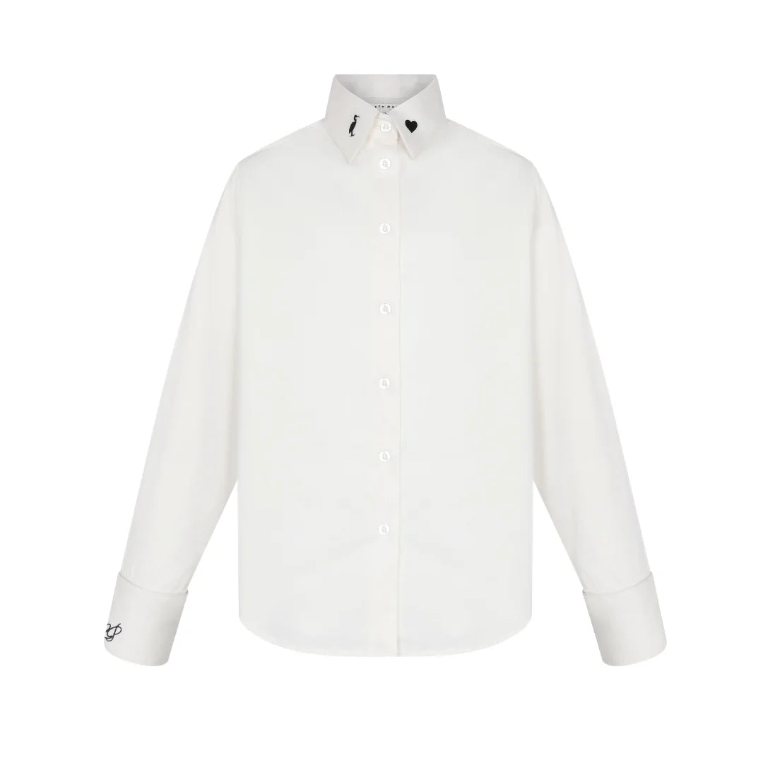 A front view of the Little Parni teen's elegant embroidered shirt in white and grey.