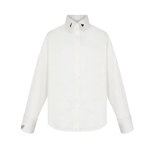 A front view of the Little Parni teen's elegant embroidered shirt in white and grey.