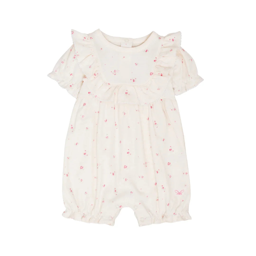 A front view of the elegant Livly Rose Garden Edith Jumpsuit in Ivory.