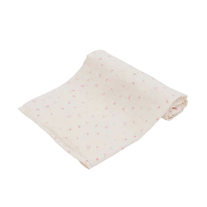 Swaddled in the Livly Rose Garden blanket.