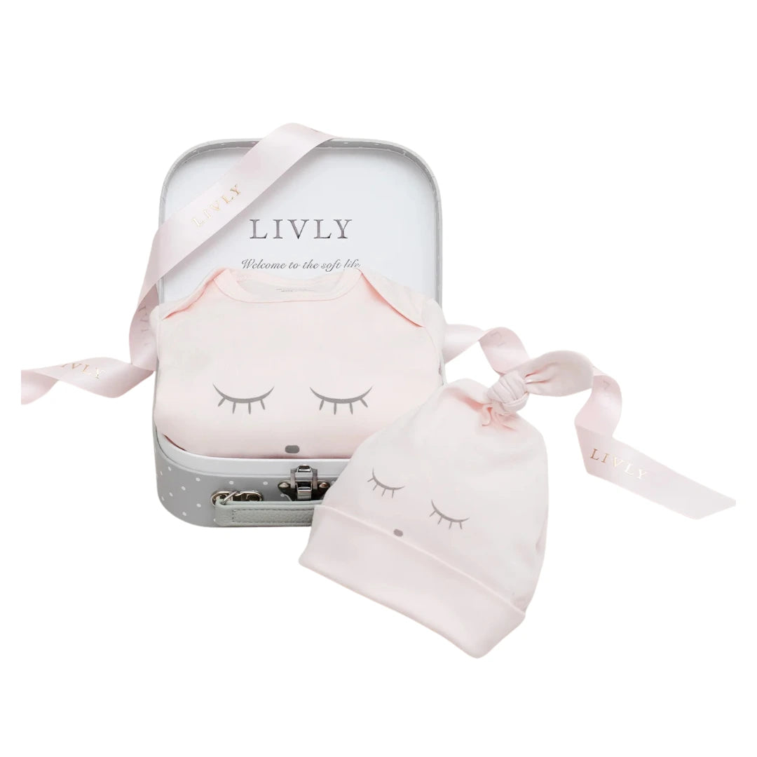 A flat-lay view of the Livly Sleeping Cutie mini kit in pink.