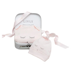 A flat-lay view of the Livly Sleeping Cutie mini kit in pink.