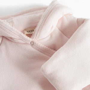 A high-resolution close-up highlighting the quilted texture and "Rosa" floral pattern.