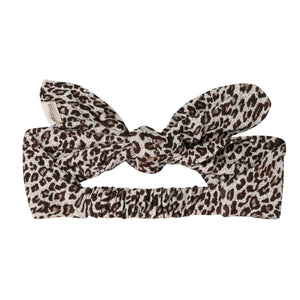 A flat lay display of the MarMar Copenhagen leopard print hair accessory.