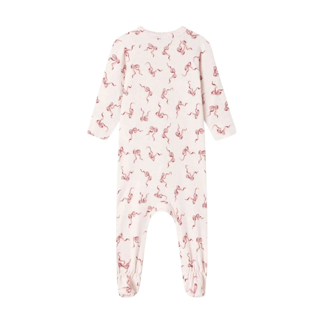 A back view of the organic cotton pink footed romper with bow pattern.