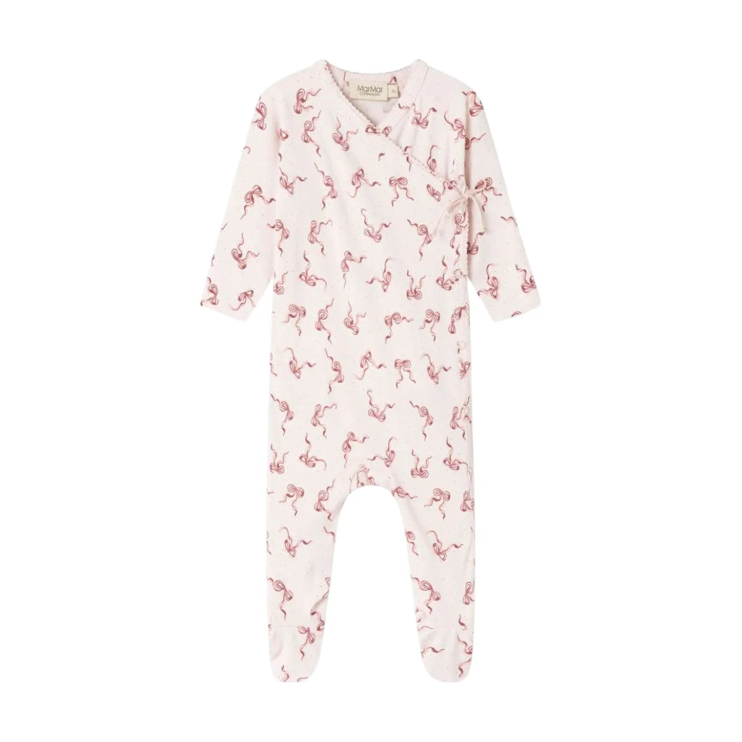 A flat-lay view of the MarMar Copenhagen Rubetta footie in bows pink.