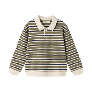 A children's long-sleeve polo shirt with horizontal stripes in olive green, navy blue, and cream, featuring a solid cream collar, cuffs, and hem, and a small embroidered logo on the left chest.