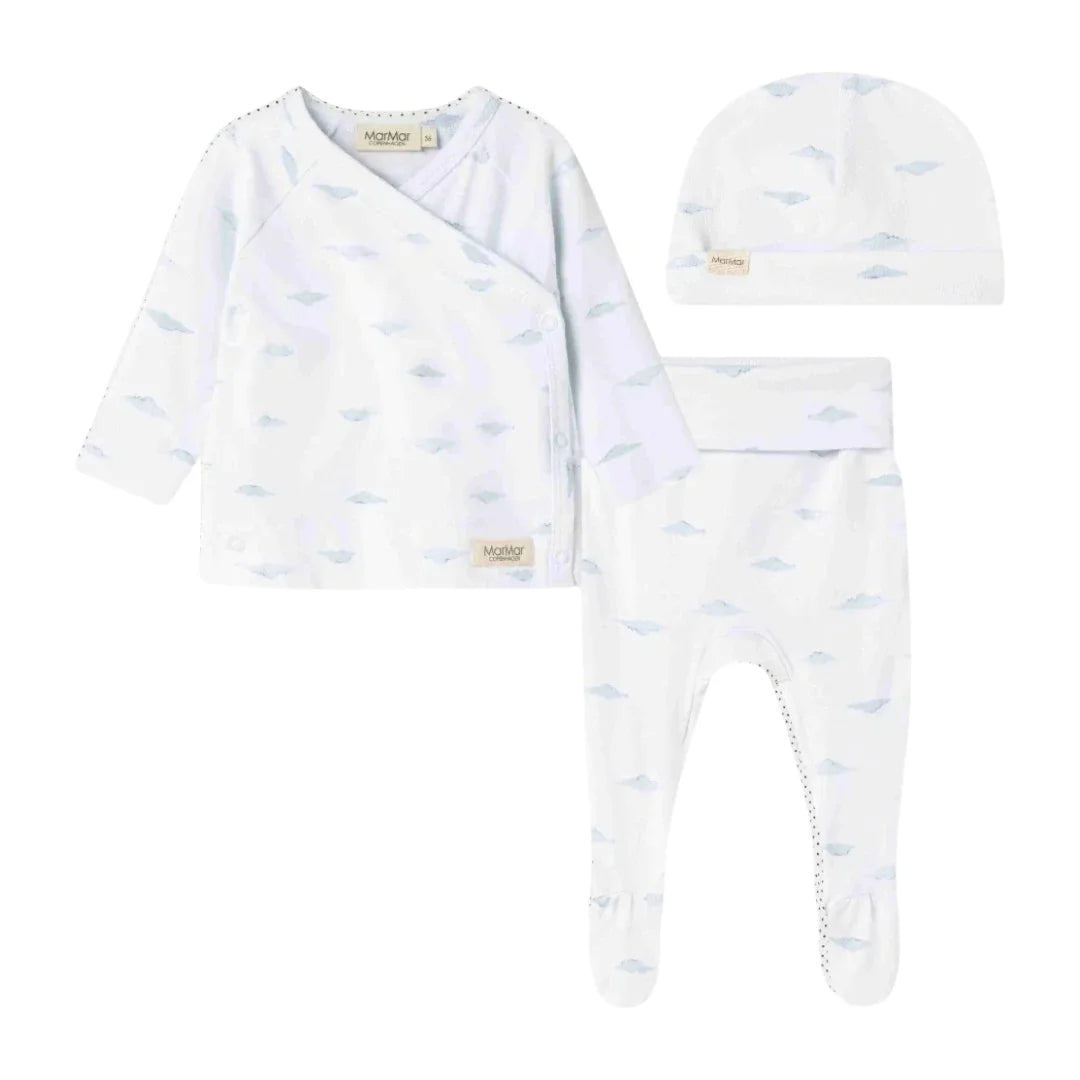 A front view of the MarMar Copenhagen cumu neutral wrap set and matching baby hat.