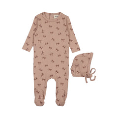 A front view of the Mema Knits bow print pointelle footie and bonnet set in pink with dark pink bows.