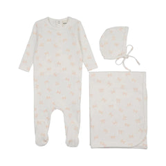 A front view of the Mema Knits bow print pointelle footie three-piece set in winter white with rose smoke bows.