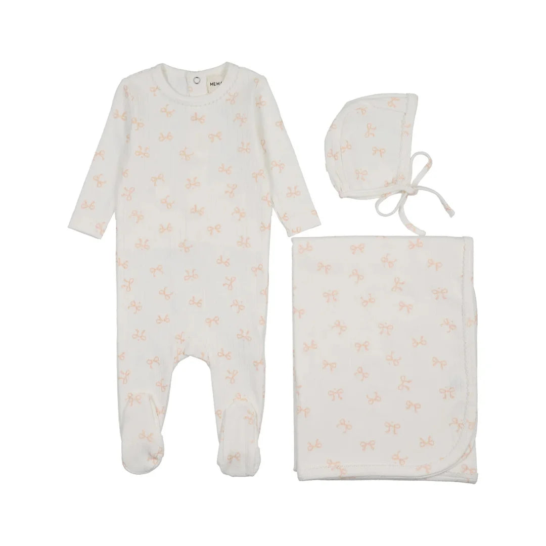A flat-lay view of the Mema Knits bows print pointelle footie 3-piece set in winter white and rose smoke.