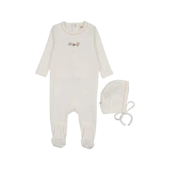 A front view of the Mema Knits white footie and bonnet set with pink floral embroidery.