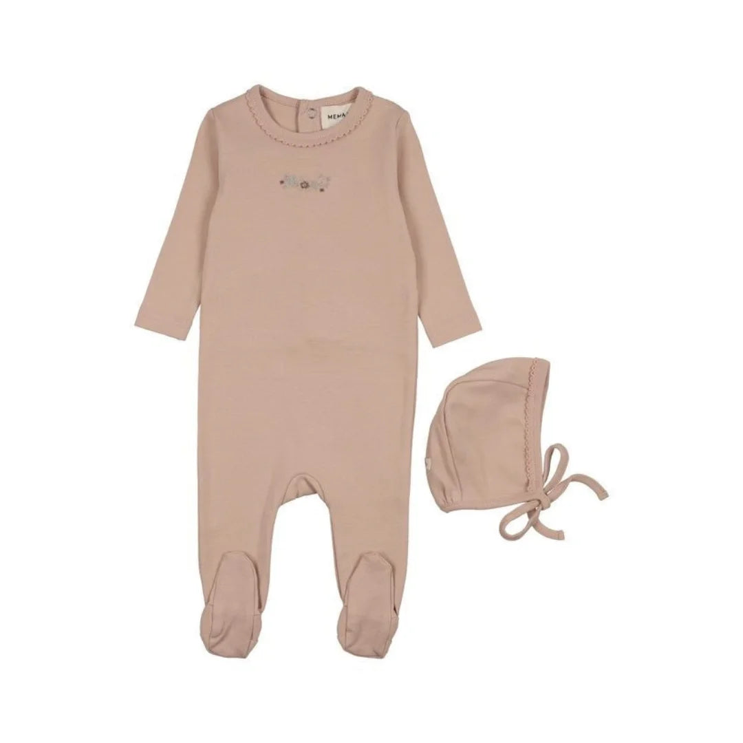A flat-lay view of the Mema Knits floral pink embroidery footie and bonnet set.