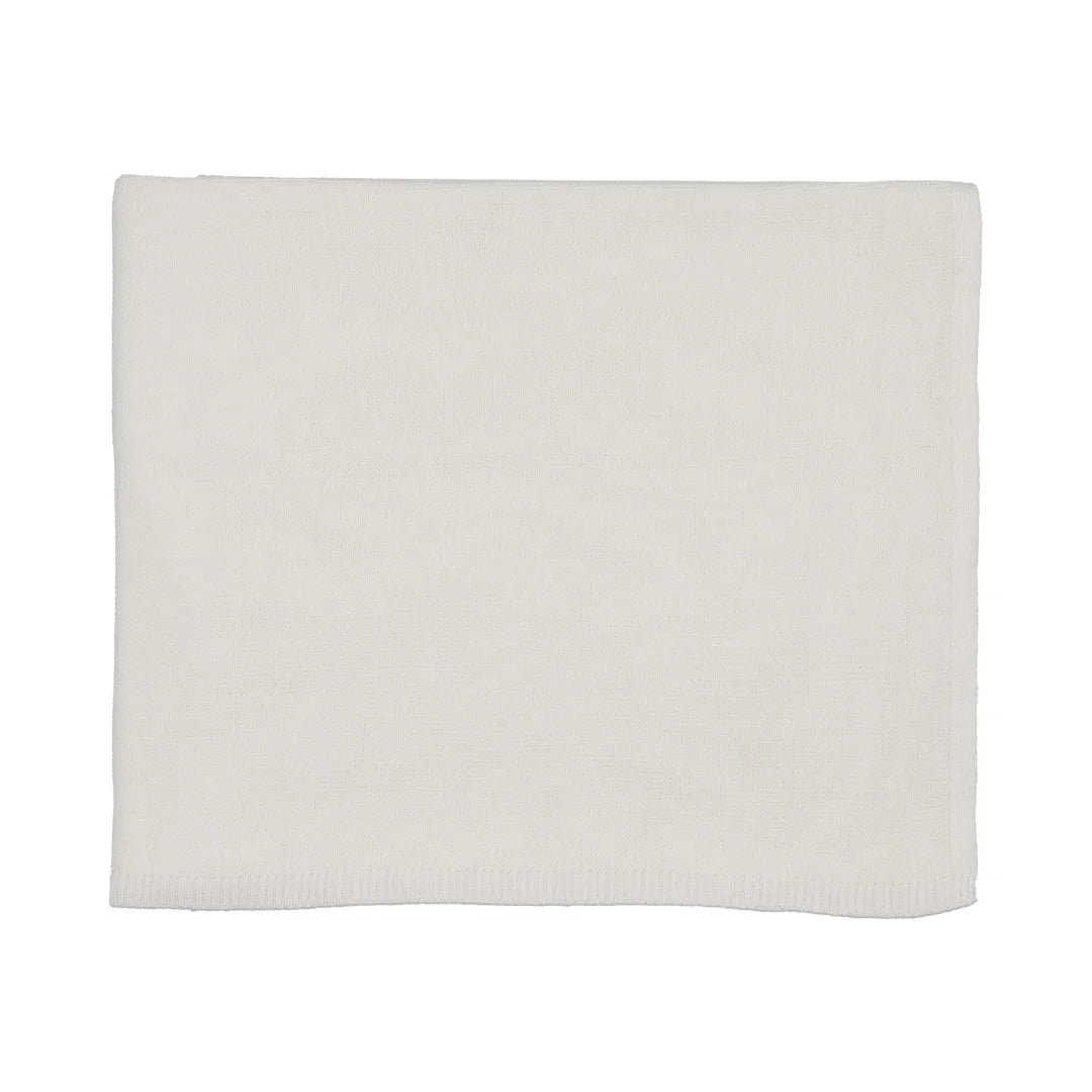 A front view of the Mema Knits knitted bris blanket in winter white.