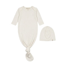 A front view of the Mema Knits polka dot sleep bag and beanie set in multi.