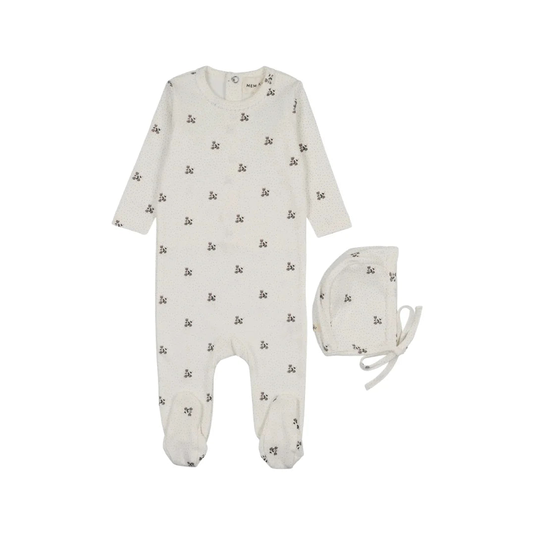A front view of the Mema Knits printed snap-back footie and bonnet set in blue floral print.