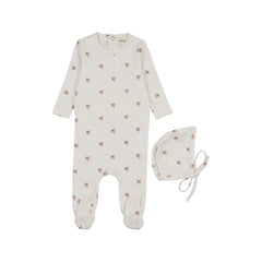 A front view of the Mema Knits printed snap-back footie and bonnet set in coral floral print.