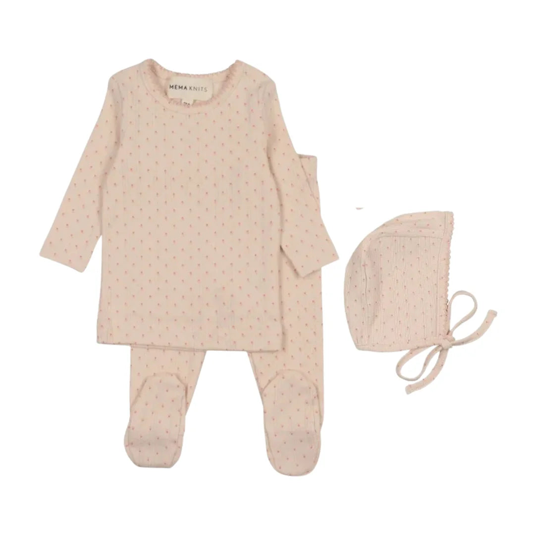 A front view of the Mema Knits pink tulip print two-piece set and bonnet.