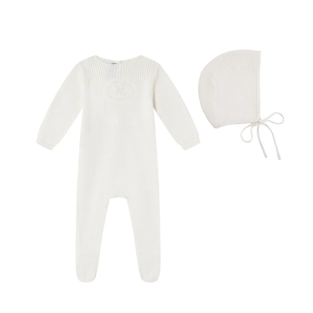 A front view of the Mini Label cream embossed emblem knit footie 4-piece set box.