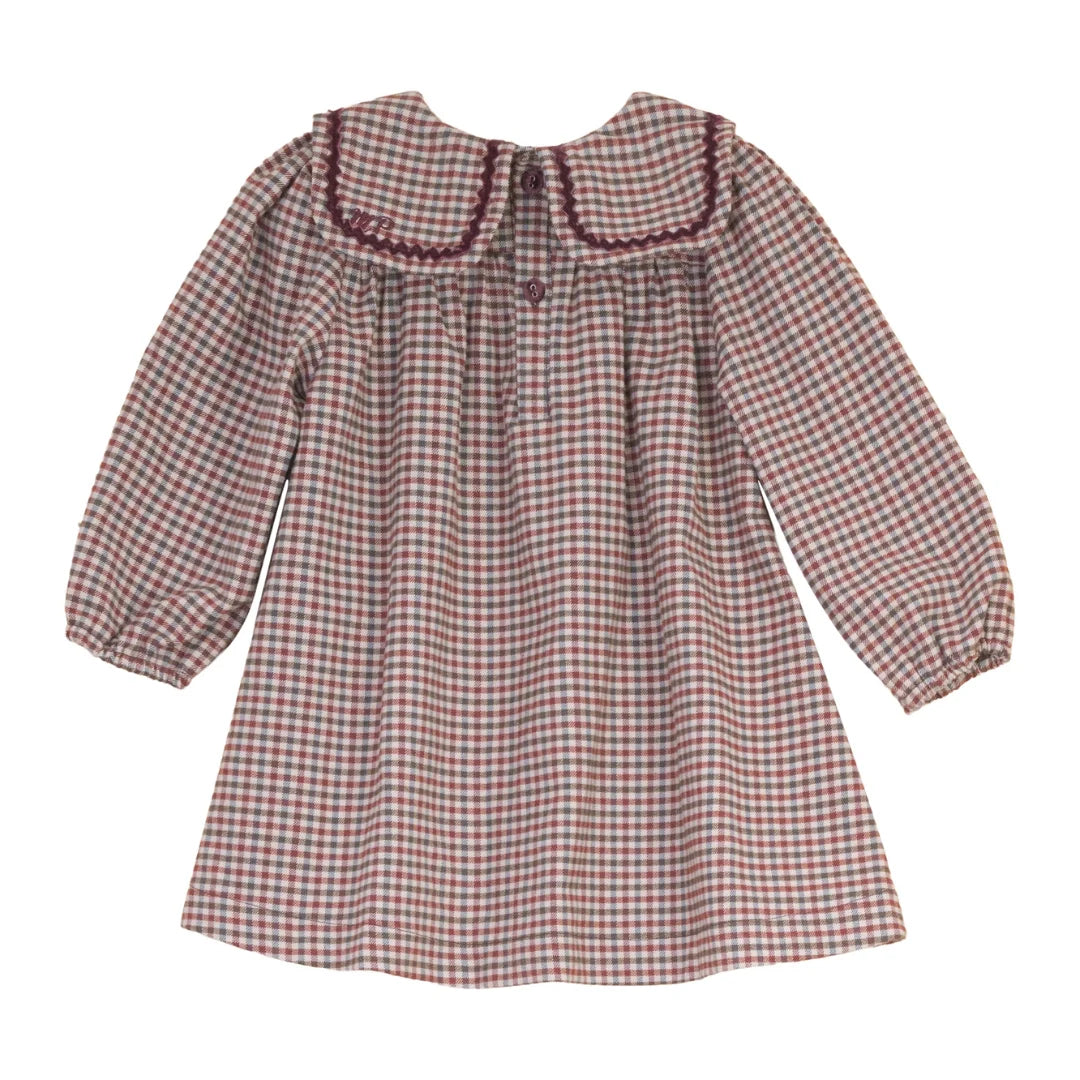 The clean back view of the structured toddler holiday dress.