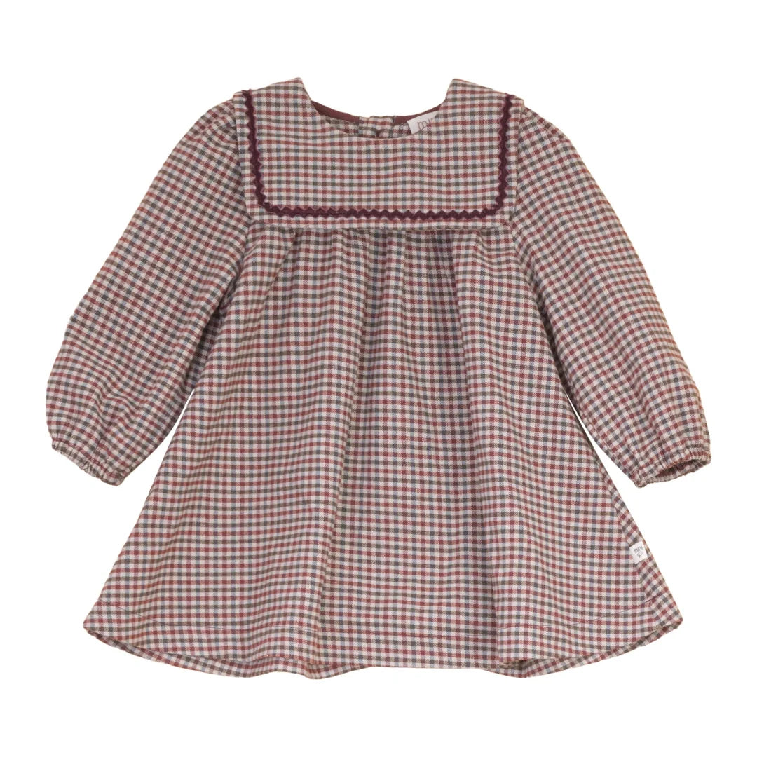 A front view of the Mini P burgundy velvet holiday dress with rick rack trim.