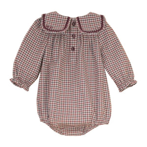 The clean back view of the luxury children's designer velvet romper.
