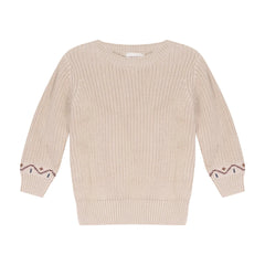 A front view of the Mini P cream chunky knit baby crewneck sweater.