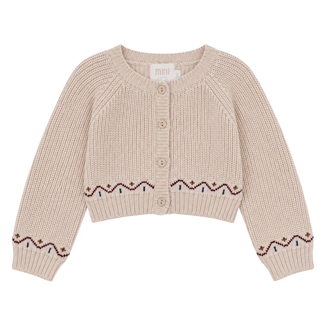 A front view of the Mini P cream knit baby cardigan sweater.