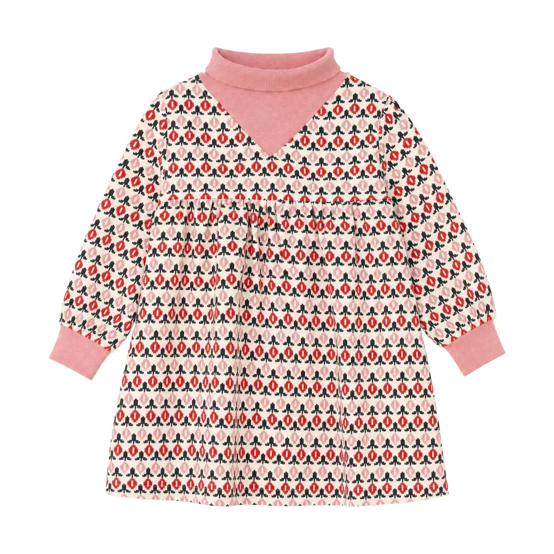 A front view of the Mini P cream and red printed corduroy dress for infants and toddlers.
