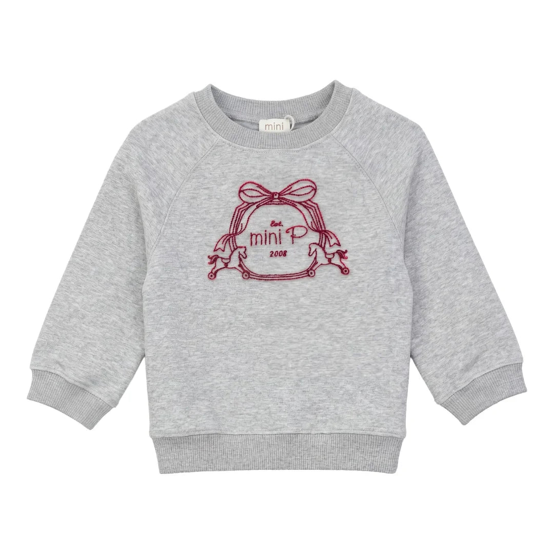 A front view of the Mini P grey and red fleece sweatshirt with velvet emblem.