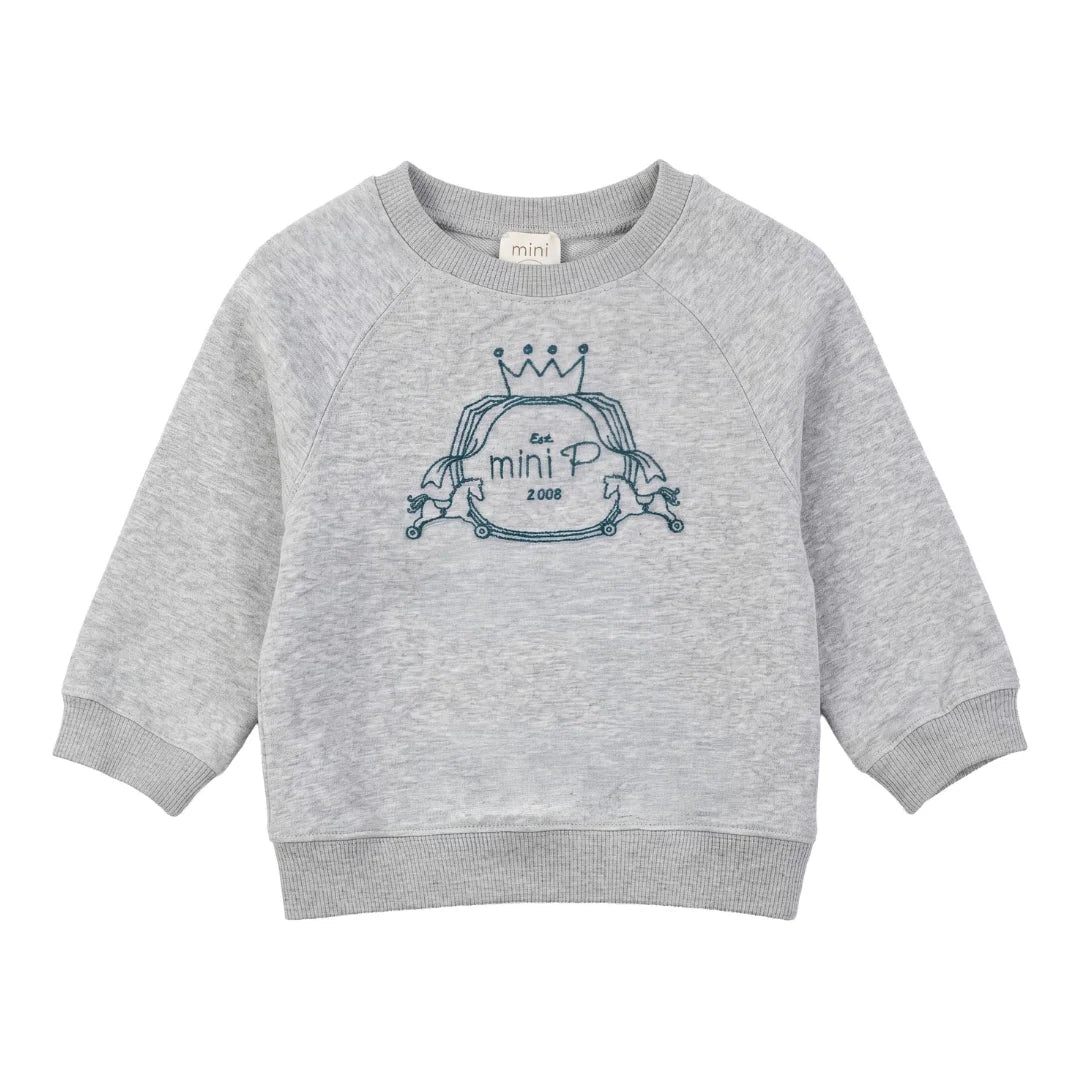 A front view of the Mini P grey and teal fleece sweatshirt with velvet emblem.