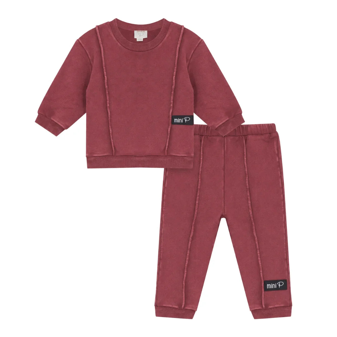 A front view of the Mini P red washed sweatshirt and pant set.