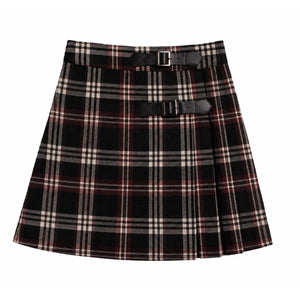 A front view of the Mode Avant burgundy pleated skirt with black accents for girls.