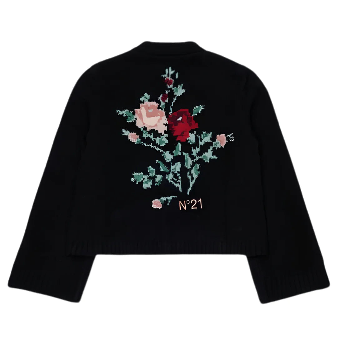 The back of the black N21 knit cardigan, prominently displaying the intricate jacquard floral design.