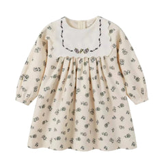 A front view of the Nou Nelle cream floral corduroy dress for children.