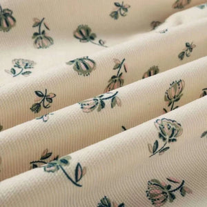 A high-resolution close-up of the fine-wale corduroy texture and button details.
