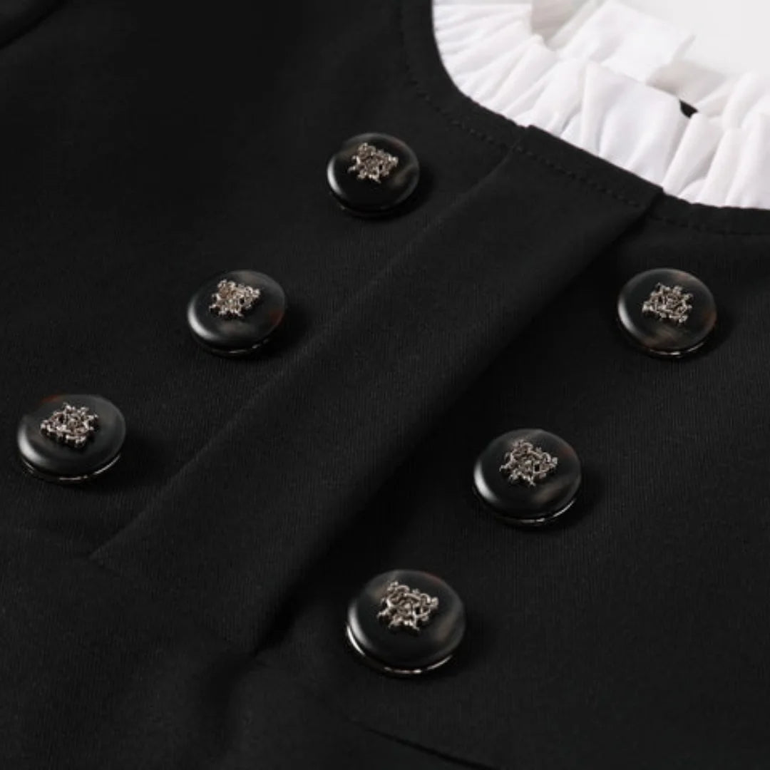 A high-resolution close-up of the smooth taffeta fabric texture and button details.