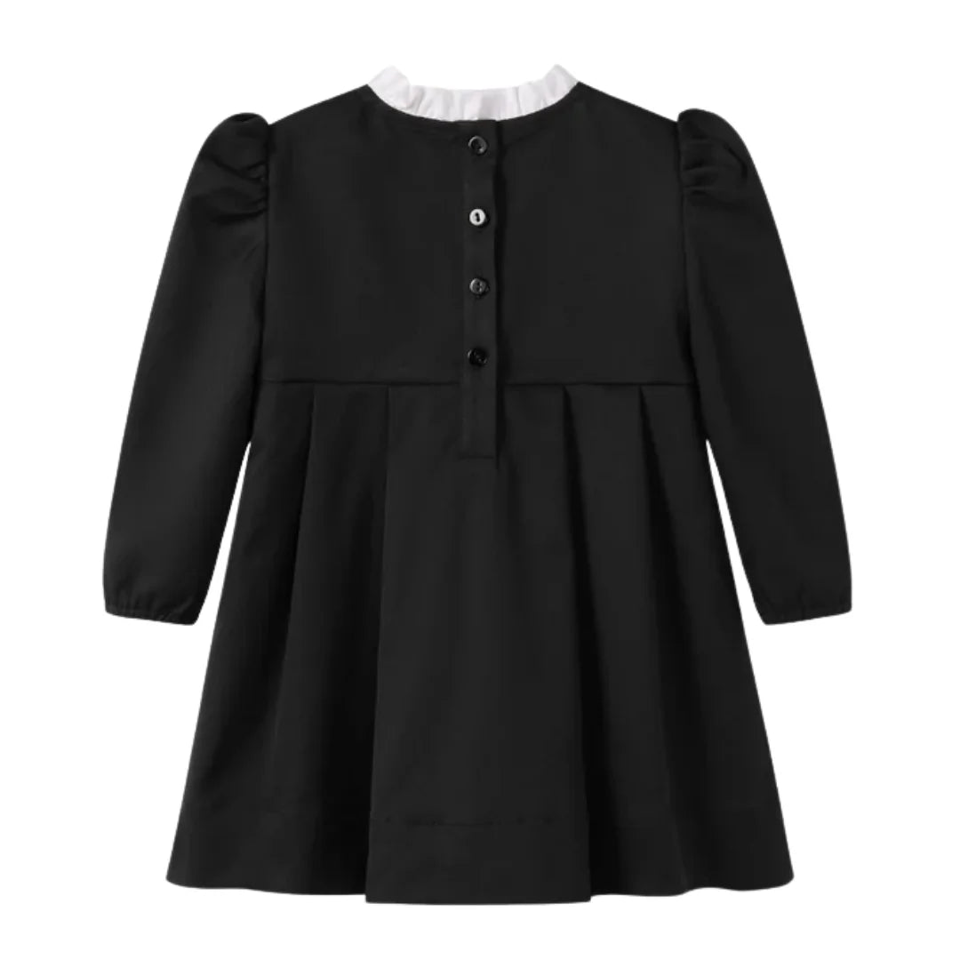 A front view of the Nou Nelle black taffeta double-breasted dress for children.