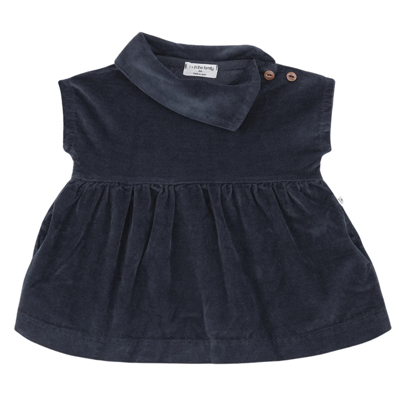 A breathtaking 1+ in the Family Aosta Knit Dress in Blue, showcasing its authoritative architectural fit and refined Spanish knit texture.