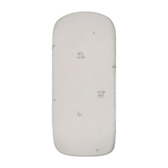 A front view of the Peluche Bebe blossom bassinet sheet in rose.