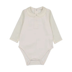 A front view of the Peluche Bebe long sleeve bodysuit with button detailing.