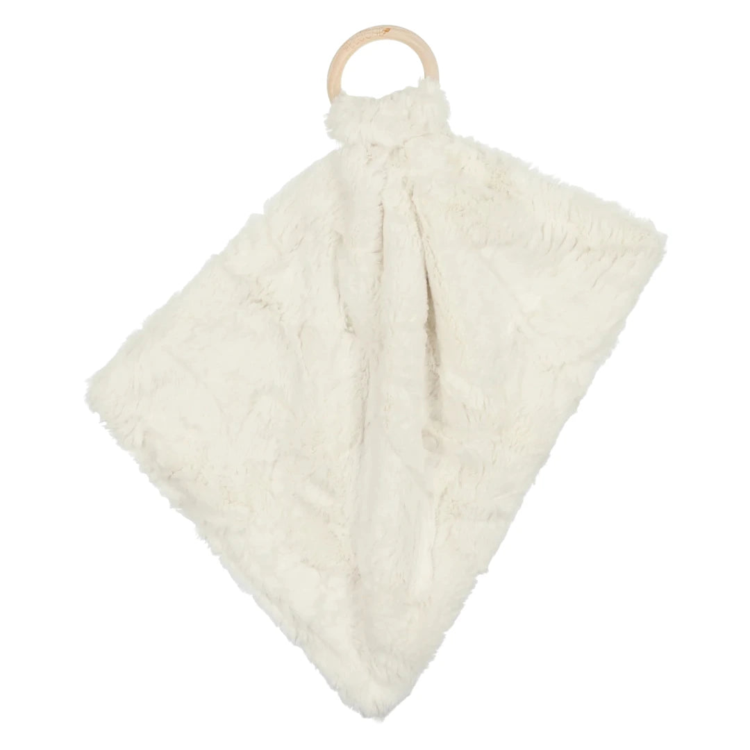 A sophisticated Peluche Bebe Mini Lux Fur Teether in an organic Natural hue, featuring high-density plush fabric looped through a smooth, architectural wooden ring.