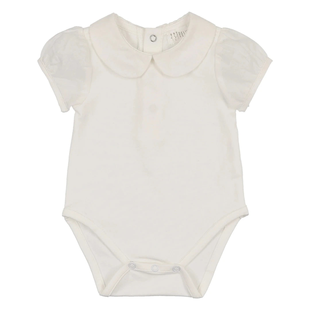 A sophisticated Peluche Bebe onesie in soft white, showcasing the breathtaking architectural puff sleeves and premium cotton texture.