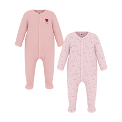 A front view of the two-pack Petit Bateau velour footies, one with a floral print and one solid pink.