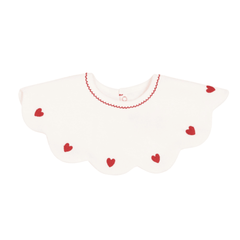 A breathtaking Petit Bateau Baby Bib in pristine white, featuring a delicate heart detail and a secure snap closure.