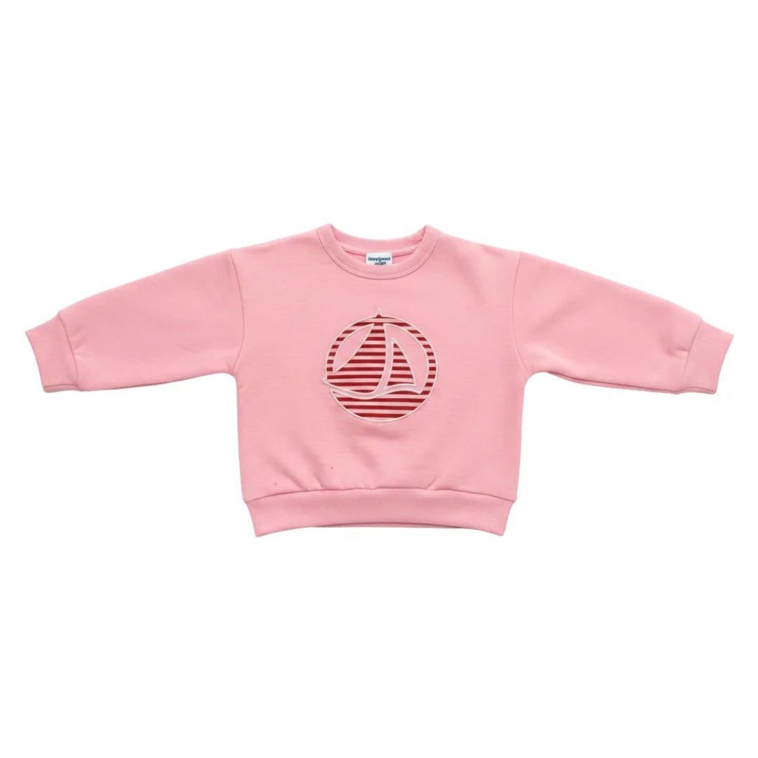 A breathtaking Petit Bateau baby girl pullover sweatshirt featuring an immaculate pink palette and a classic heritage boat logo graphic.
