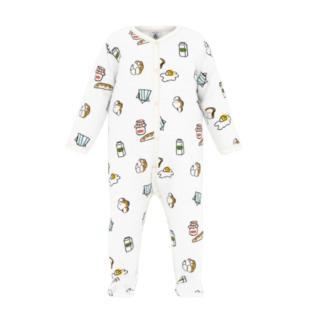 A front view of the Petit Bateau long-sleeve baby romper with a fun breakfast-themed print.
